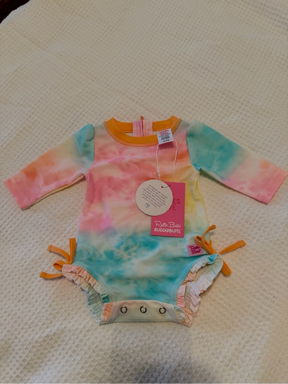 RuffleButts/RuggedButts Tie-Dye Long Sleeve One-Piece Bodysuit - Pastel